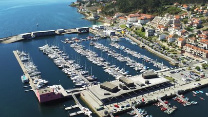 Wall Mural - Combarro, beautiful coastal village with horreos. Pontevedra,Galicia,Spain. Aerial Drone Footage