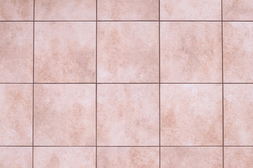 Wall Mural - Ceramic tile floor texture, stone wall background. Square pattern, smooth brown marble in the kitchen, bathroom. Abstract grunge frame, interior element.