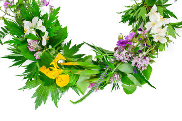 Beautiful flower wreath with colorful flowers isolated on a white background. Midsummer celebration concept, summer decoration.