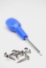Phillips Head Screws And Screwdriver