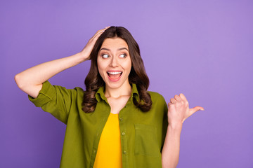 Sticker - Portrait of crazy astonished girl impressed indicate incredible ads promotion discount point thumb finger touch head hands scream wear good look outfit isolated violet color background