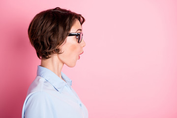 Close-up profile side view portrait of her she nice attractive funky cheerful glad amazed brown-haired girl employer new novelty copy space reaction isolated pink pastel color background