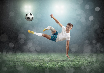 Soccer player on a football field in dynamic action 