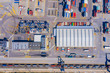 © netsay - Aerial view of huge area with stacked cargo containers at the port