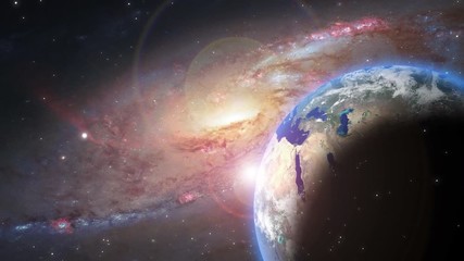 Wall Mural - video of universe or aerial flyby. camera moves towards hand holding planet earth while stars flyby.