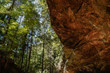 © Kathy - Ash Cave at Hocking Hills State Park in Ohio. Unique split view of woods and cave wall.