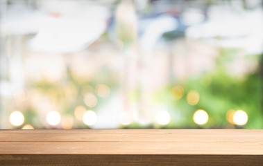 Wall Mural - Wooden table on defocuced window with curtain background