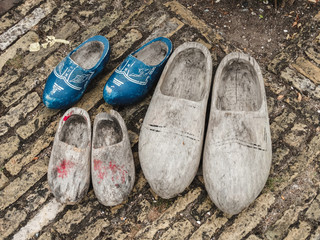 Three pairs of used wooden dutch clogs