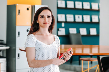 Wall Mural - Latin young mexican woman in a workplace in Mexico 