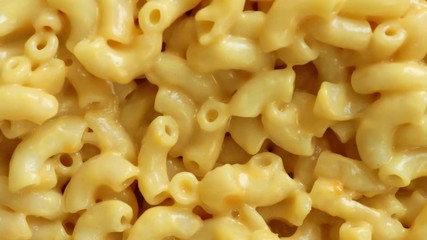 Wall Mural - Closeup of Rotating Macaroni and Cheese