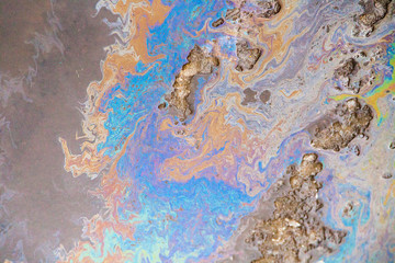  Dirty puddle with oil slick texture background