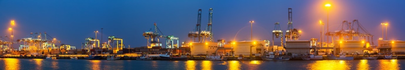 Wall Mural - night panorama of Industrial seaport of Algeciras in evening. Spain