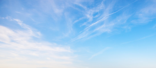 View of the blue sky with white clouds. Heavenly beauty. For wallpapers, backdrops and covers. 