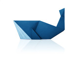 Fototapeta  - Photo of paper origami marine blue whale isolated on a white