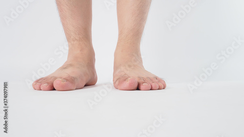 Photographie Male leg is isolated on white background