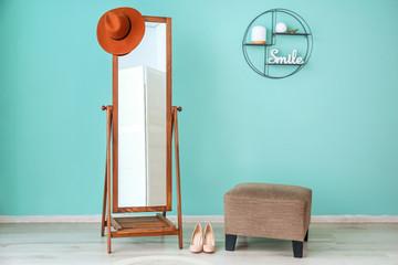 Sticker - Big mirror and pouf near color wall in room