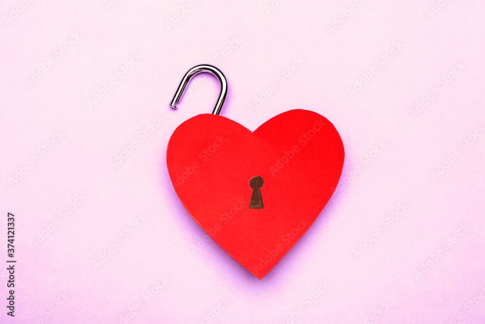 Padlock in shape of heart and key on color background