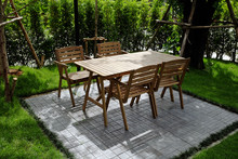 Leisure Corner With Wood Chairs And Table Outdoor Green Natural Background