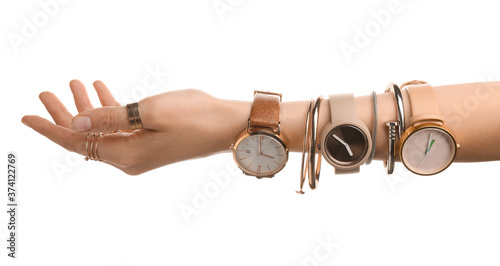Fotomural Female hand with stylish wrist watches on white background