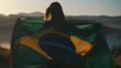 Proud girl of her country with flag of Brazil