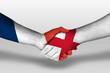 Handshake between england and france flags painted on hands, illustration with clipping path.