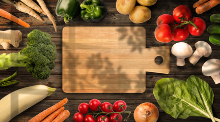 Organic Vegetables Positioned Around Wooden Board - Top View Mockup