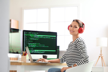 Female programmer working in office