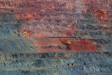 Open pit iron ore mining.