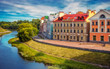 Urban architecture, beautiful houses by the river. Golden Embankment, Pskov, Russia.