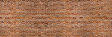 Vintage Exposed Brown And Red Old Brick Wall. Brickwork Textured Background And Long Brown Banner.