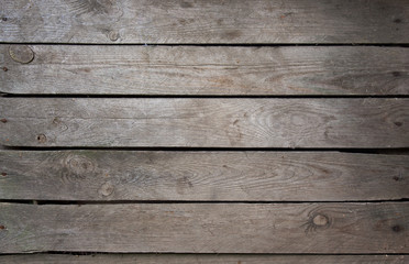 Light grey vintage weathered wooden texture or background.. The texture of the tree. Old staphets.