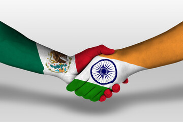 Wall Mural - Handshake between india and mexico flags painted on hands, illustration with clipping path.