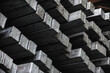 Steel billets in the warehouse of metallurgical factory. Hot ingot in a steel plant.