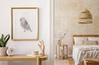 © FollowTheFlow - Interior design of bedroom with mock up picture frame, wooden console, plants, clock, coffee table, rattan decoration and elegant accessories in stylish home decor.