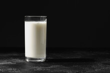 Glass Of Milk On Table Close Up