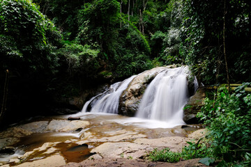 Poster - Beautiful waterfall in the forest wallpaper background