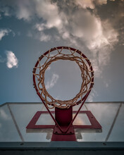 Basketball Under Beautiful Summer Sunlight With Clouds Background