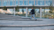© nimito - Fat businessman in formal suit running up stone stairs near office building being late