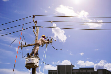 Silhouette person technicians workers on high voltage transmission systems