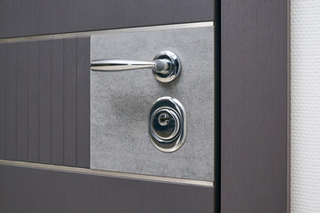 Handle details entrance door finished with wood veneer aтв stone blue steel color	