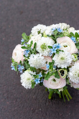 Wall Mural - Bouquet of flowers with Ranunculus, anemones close-up