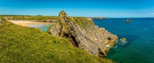 Limestone Cliffs At The Entrance To Broad Haven Beach On The Pembrokeshire Coast, Wales In Early Summer