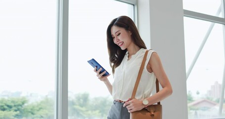 Poster - businesswoman use smart phone