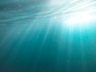 underwater texture shot blue sea water with sunbeam