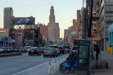 Wall Mural - Standing out in the traffic panorama looking in Manhattan, down 4th Avenue between the skyscrapers