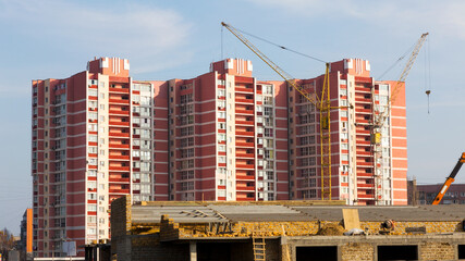 Odessa, Ukraine - February 25, 2016: Sky above multi-storey building, new home for many families and new life, construction of multi-storey building as symbol of hope for better life