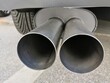 © fotofox33 - Twin exhaust on sports car, close-up