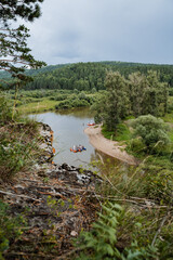 rock mass, river flows at the foot of the rocky mountains, white stone rocks, nature of Russia, southern Urals, Yuryuzan river, travel idea