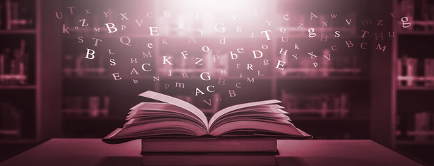 Poster - The concept of education by planting a tree of knowledge in the opening of an old book in the library and the magical magic of light that flies to the destination of success. Beautiful background