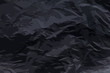 Completely burned black sheet of paper texture background